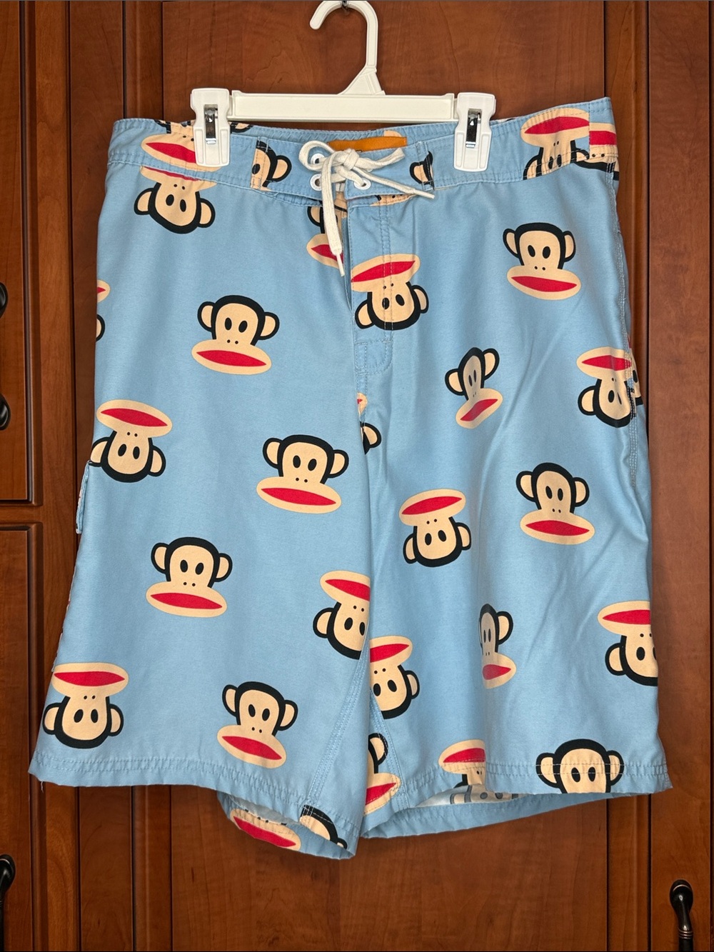 Paul Frank Men’s Light Blue Monkey Face Swim Board Shorts. Size: 34